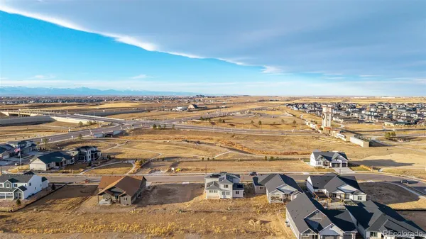 an aerial view of residential building with ocean view
