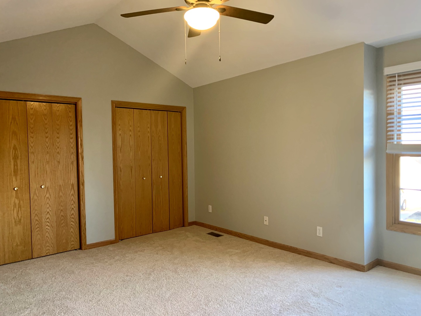 686 South Peace Road, Unit 686 Sycamore, IL 60178 - Photo 11 of 15 an empty room with windows and closet