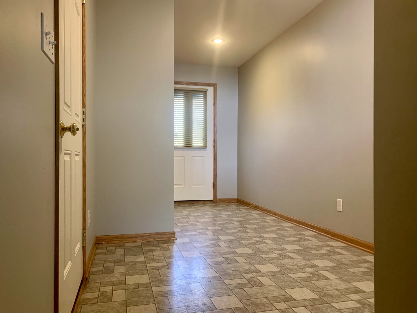 686 South Peace Road, Unit 686 Sycamore, IL 60178 - Photo 3 of 15 a view of an empty room and window