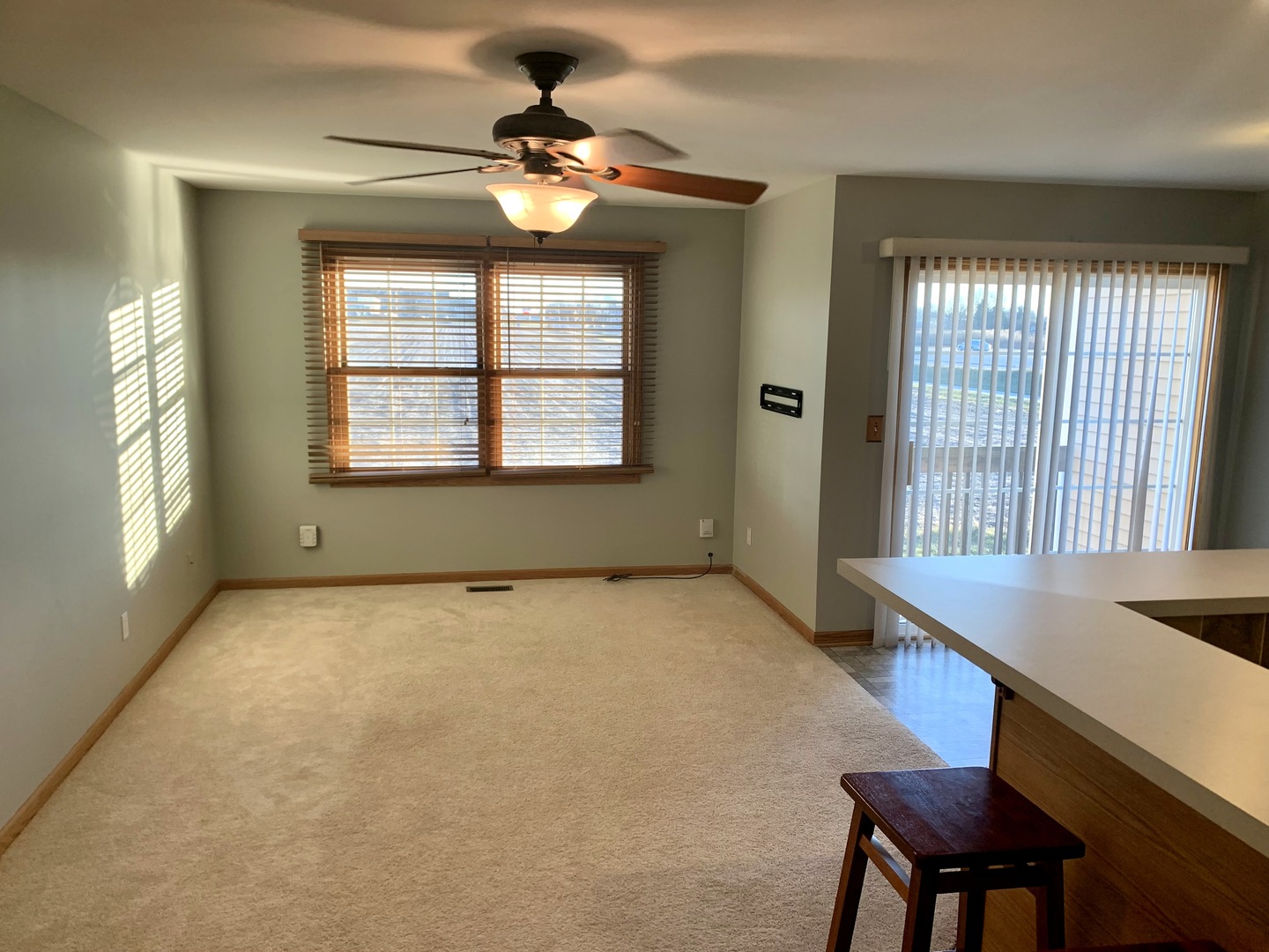 686 South Peace Road, Unit 686 Sycamore, IL 60178 - Photo 7 of 15 a view of an empty room with a window