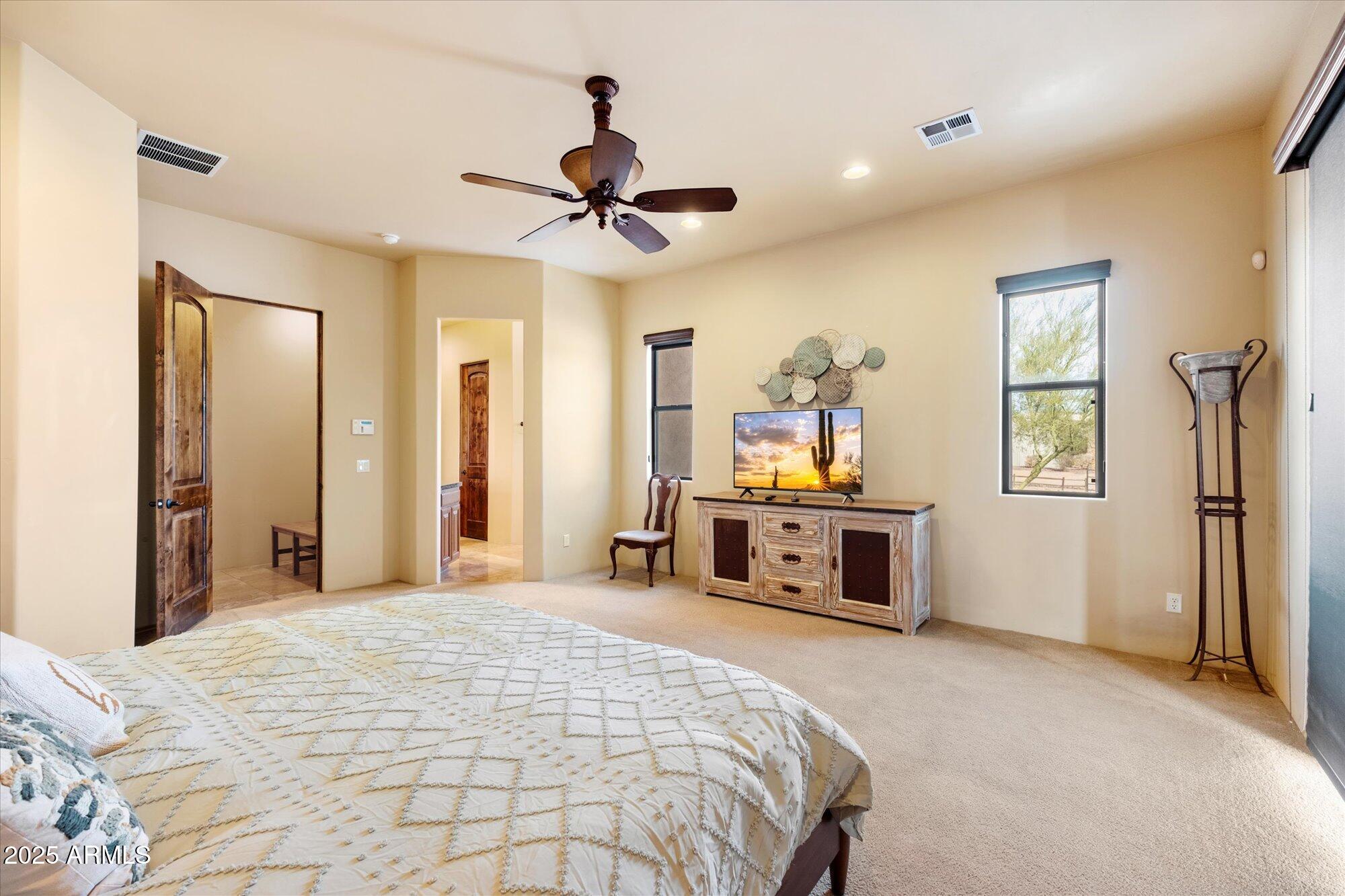 29317 North 164th Street Scottsdale, AZ 85262 - Photo 14 of 27 a bedroom with a bed and a flat screen tv