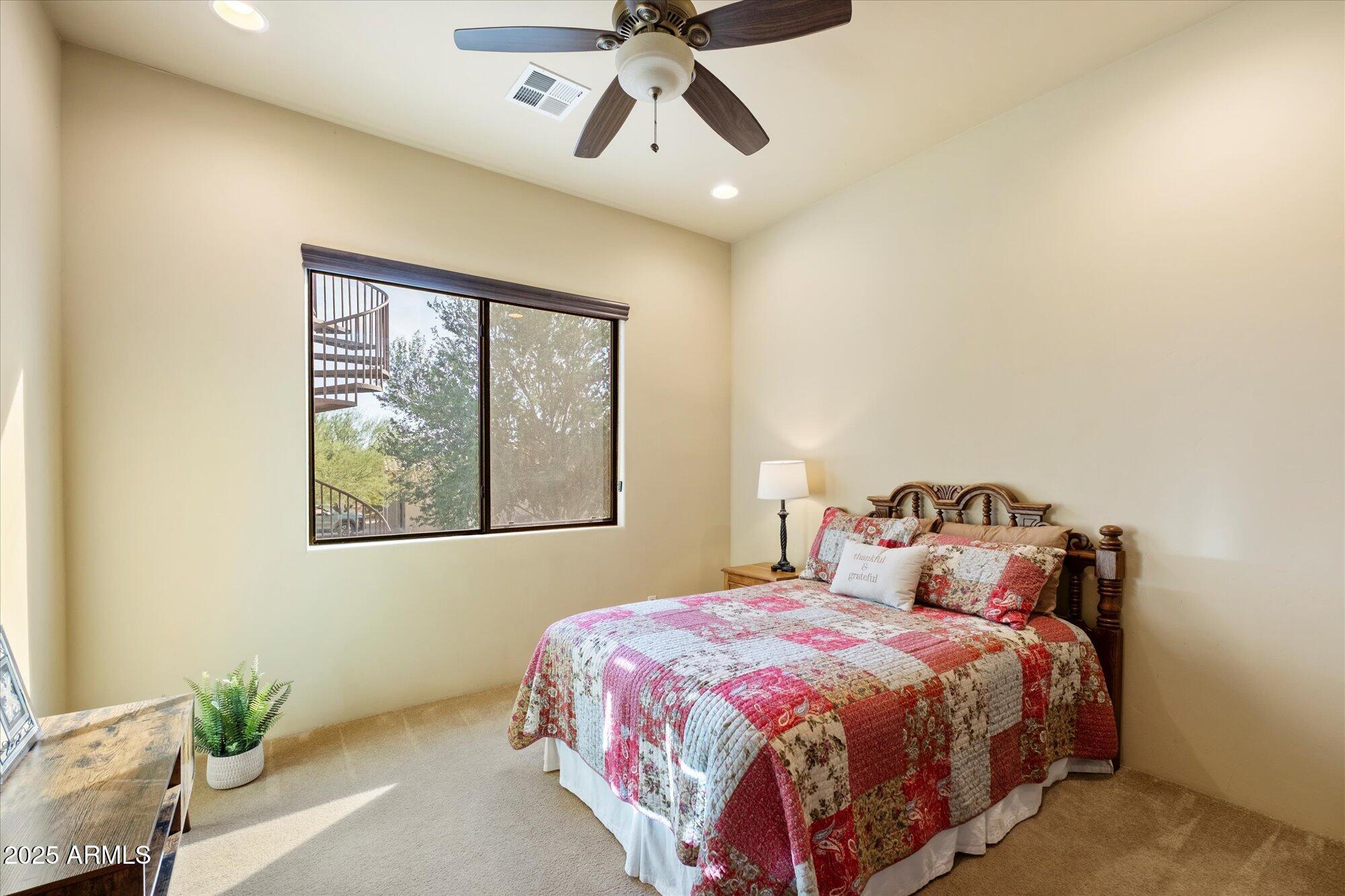 29317 North 164th Street Scottsdale, AZ 85262 - Photo 18 of 27 a bedroom with a bed and painting on the wall