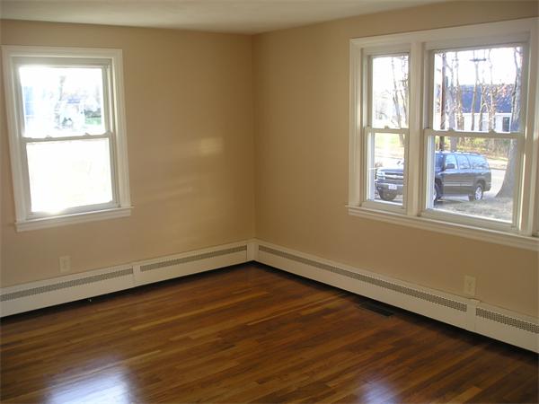 661 Plumtree Road Springfield, MA 01118 - Photo 8 of 10 a view of a room with wooden floor and a window