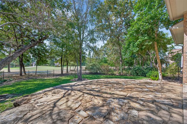 a view of a street with a trees
