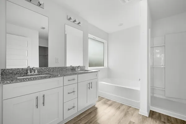 a bathroom with a bathtub