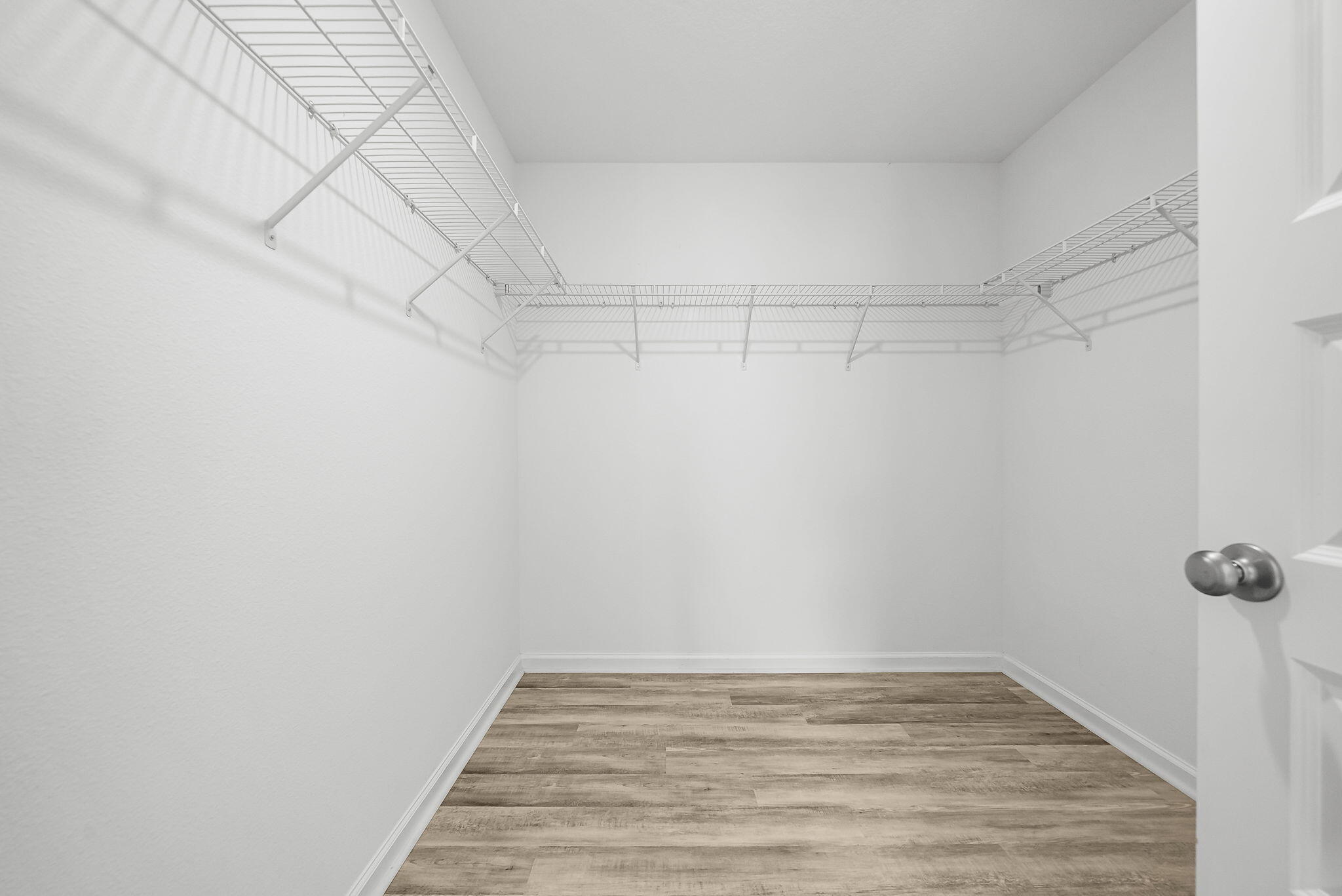 39 Riverwalk Crossing Freeport, FL 32439 - Photo 21 of 32 a view of a room with racks on the wall