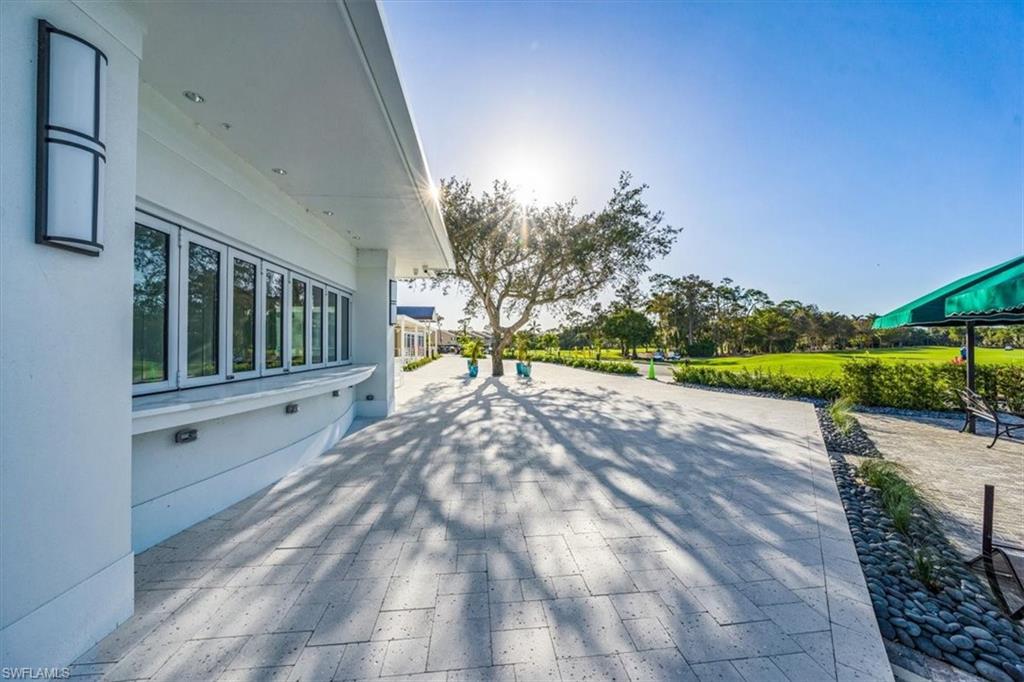 1101 Foxfire Lane Naples, FL 34104 - Photo 33 of 38 a view of outdoor space and yard