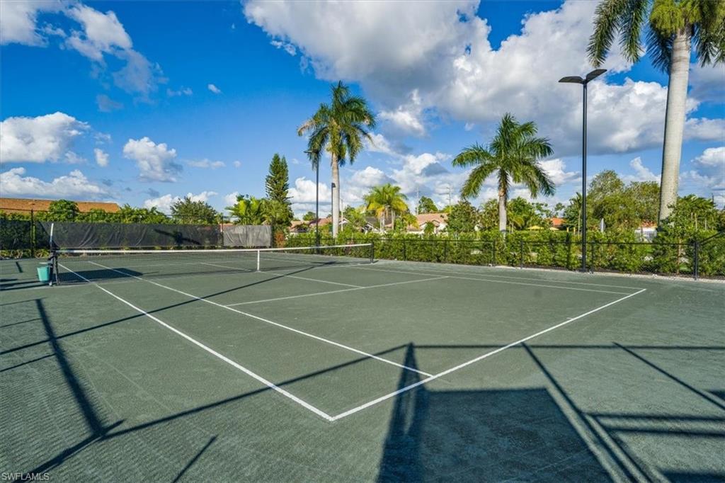 1101 Foxfire Lane Naples, FL 34104 - Photo 36 of 38 a view of a tennis court