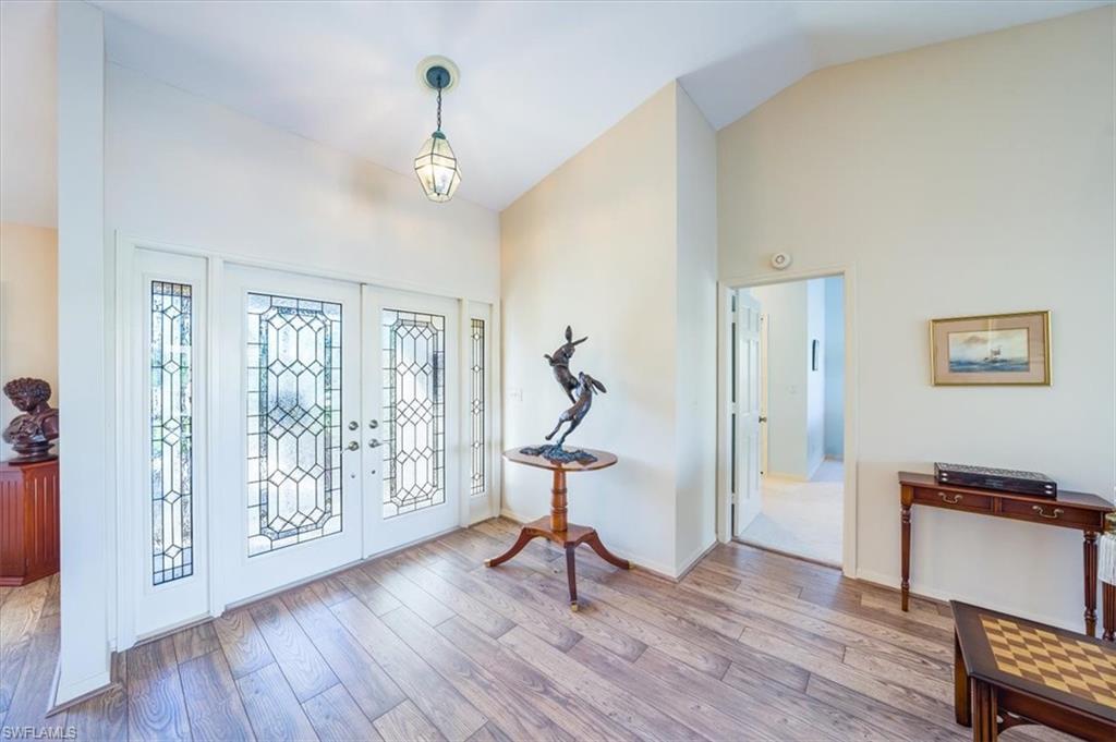 1101 Foxfire Lane Naples, FL 34104 - Photo 4 of 38 a view of a room with gym equipment