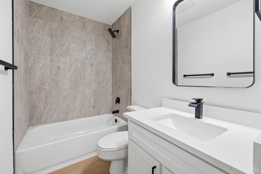 2204 Toro Canyon Road Austin, TX 78746 - Photo 15 of 26 Full bath with vanity and bathing tub / shower combination