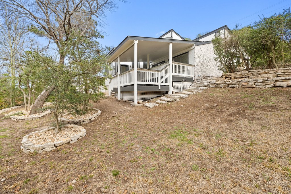 2204 Toro Canyon Road Austin, TX 78746 - Photo 25 of 26 Back of house with a porch