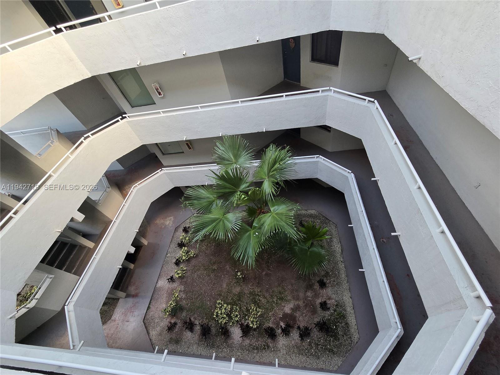 8215 Southwest 152nd Avenue, Unit G416 Miami, FL 33193 - Photo 4 of 17 a close view of stair