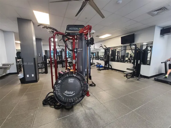 a view of a room with gym equipment