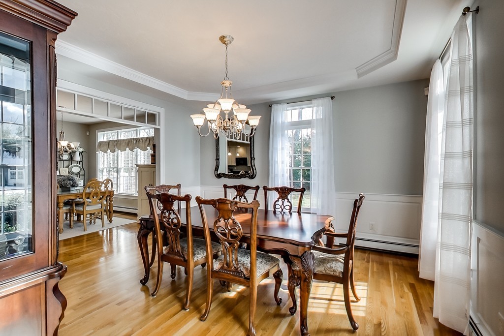 8 Rose Hill Road Hanover, MA 02339 - Photo 11 of 29 a view of a dining room with furniture window and wooden floor