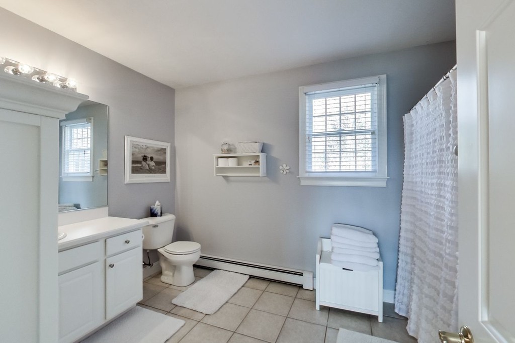 8 Rose Hill Road Hanover, MA 02339 - Photo 21 of 29 a bathroom with a toilet sink and a mirror