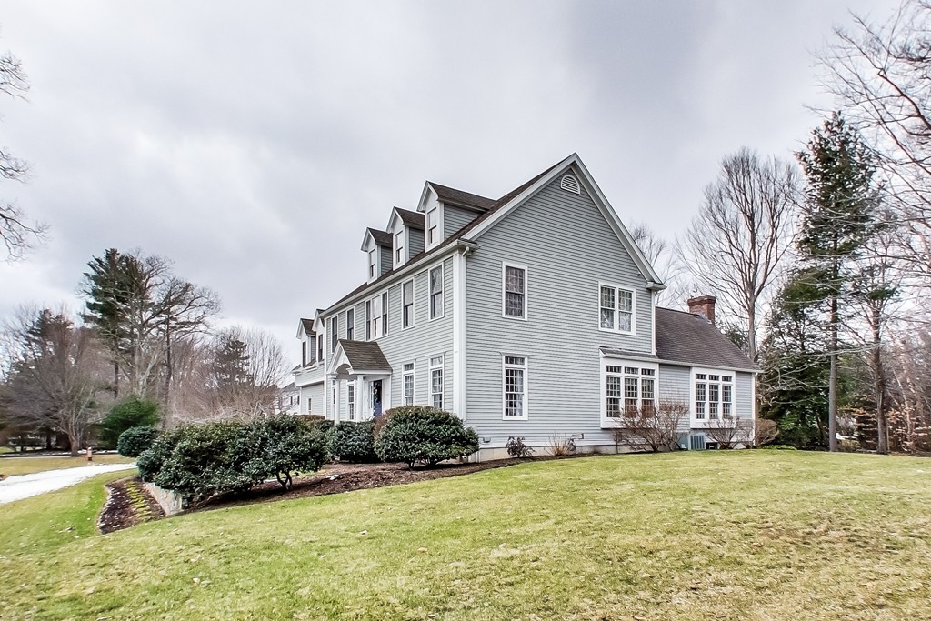 8 Rose Hill Road Hanover, MA 02339 - Photo 29 of 29 a view of a house with a yard and lawn chairs with wooden fence