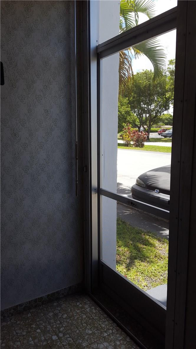 4880 Northwest 22nd Street, Unit 101 Lauderhill, FL 33313 - Photo 16 of 18 a view of a window