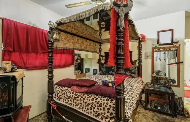 a living room with lots of furniture and a fireplace