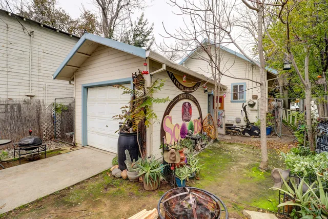 a view of a park with swings and slides