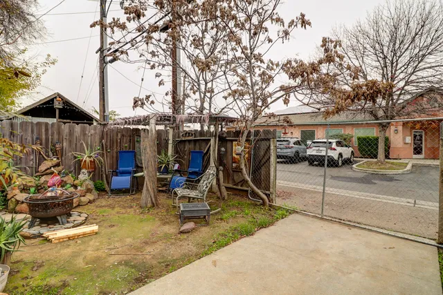 a backyard of a house with lots of green space