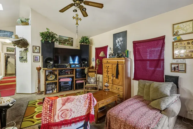 a bedroom with furniture and a bed