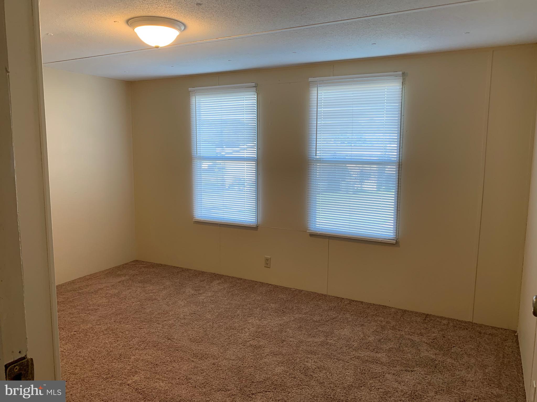 2215 Biglerville Road Gettysburg, PA 17325 - Photo 15 of 41 an empty room with windows