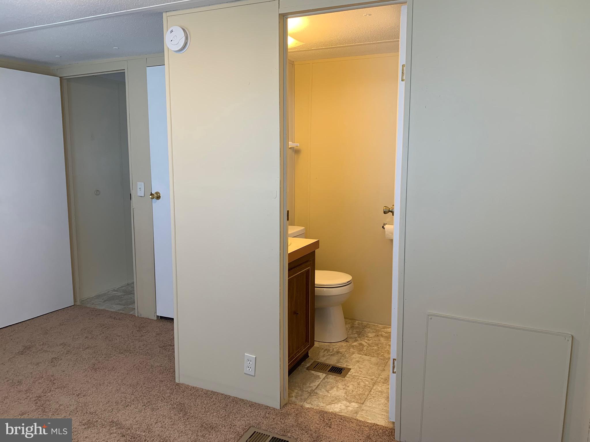 2215 Biglerville Road Gettysburg, PA 17325 - Photo 21 of 41 a bathroom with a toilet sink