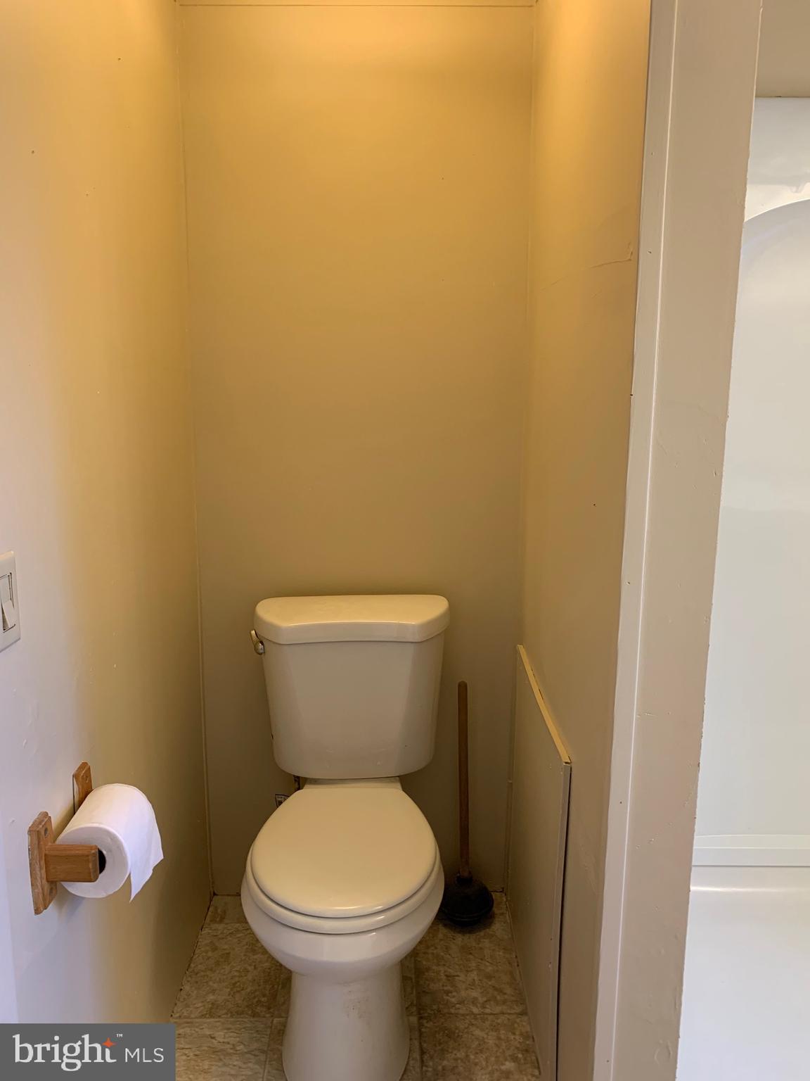 2215 Biglerville Road Gettysburg, PA 17325 - Photo 29 of 41 a white toilet sitting next to a sink