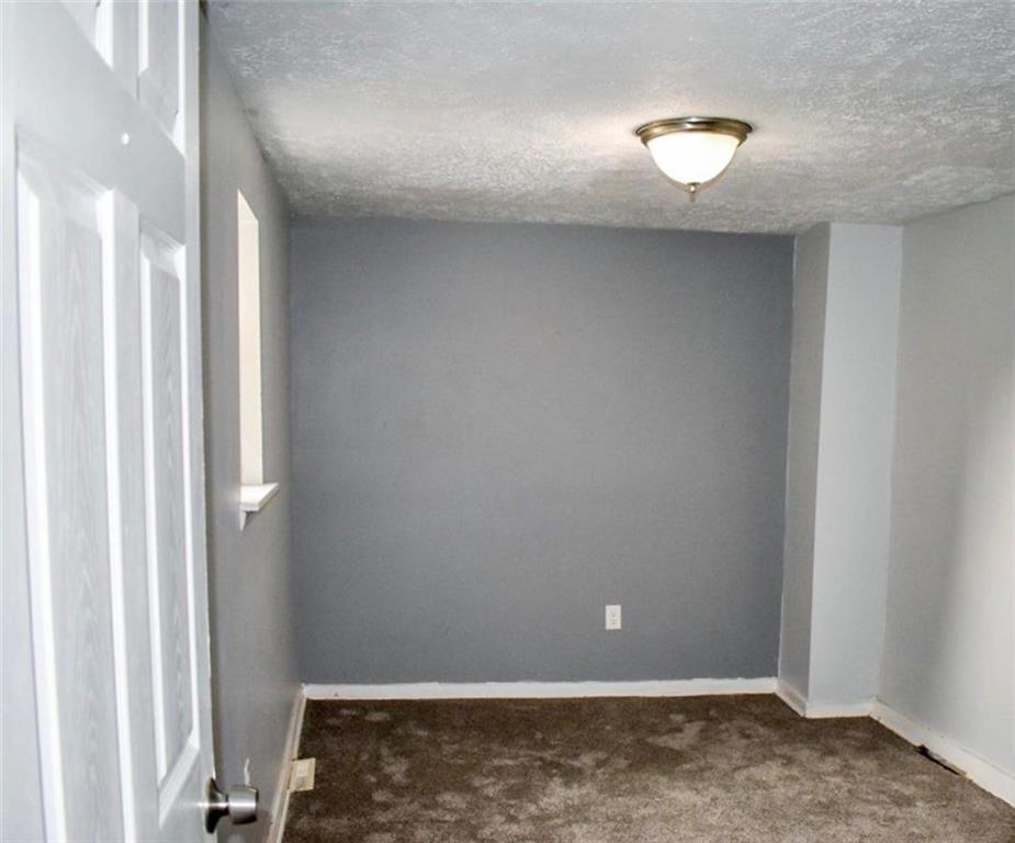 169 Union Street Bridgeville, PA 15017 - Photo 11 of 23 a view of room with stairs