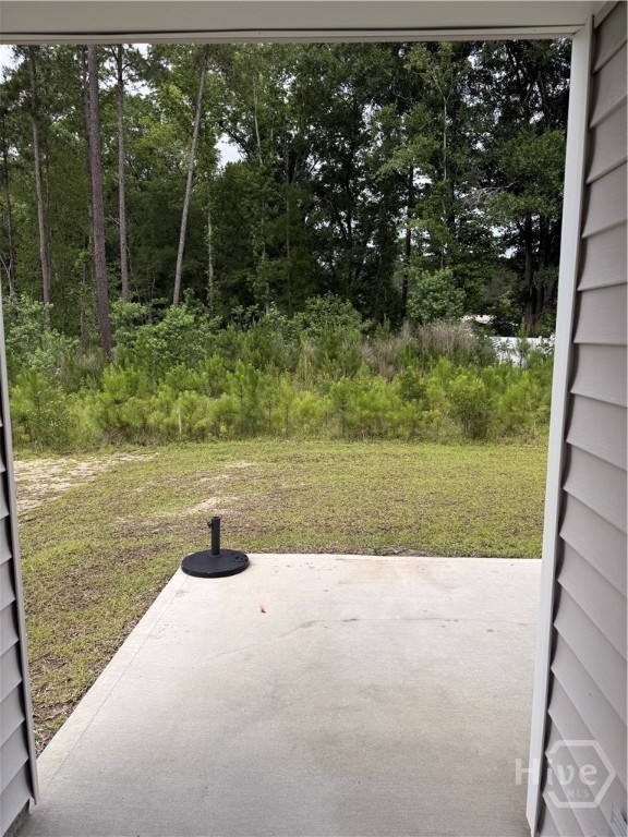 129 Coneflower Road Bloomingdale, GA 31302 - Photo 19 of 22 Door to backyard patio