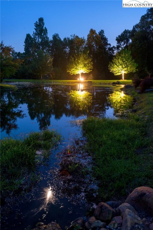 81 Adkins Farm Road Spruce Pine, NC 28777 - Photo 20 of 37 a view of a lake