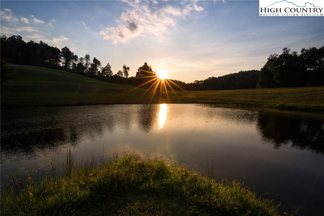 81 Adkins Farm Road Spruce Pine, NC 28777 - Photo 35 of 37 a view of outside space lake and mountain view