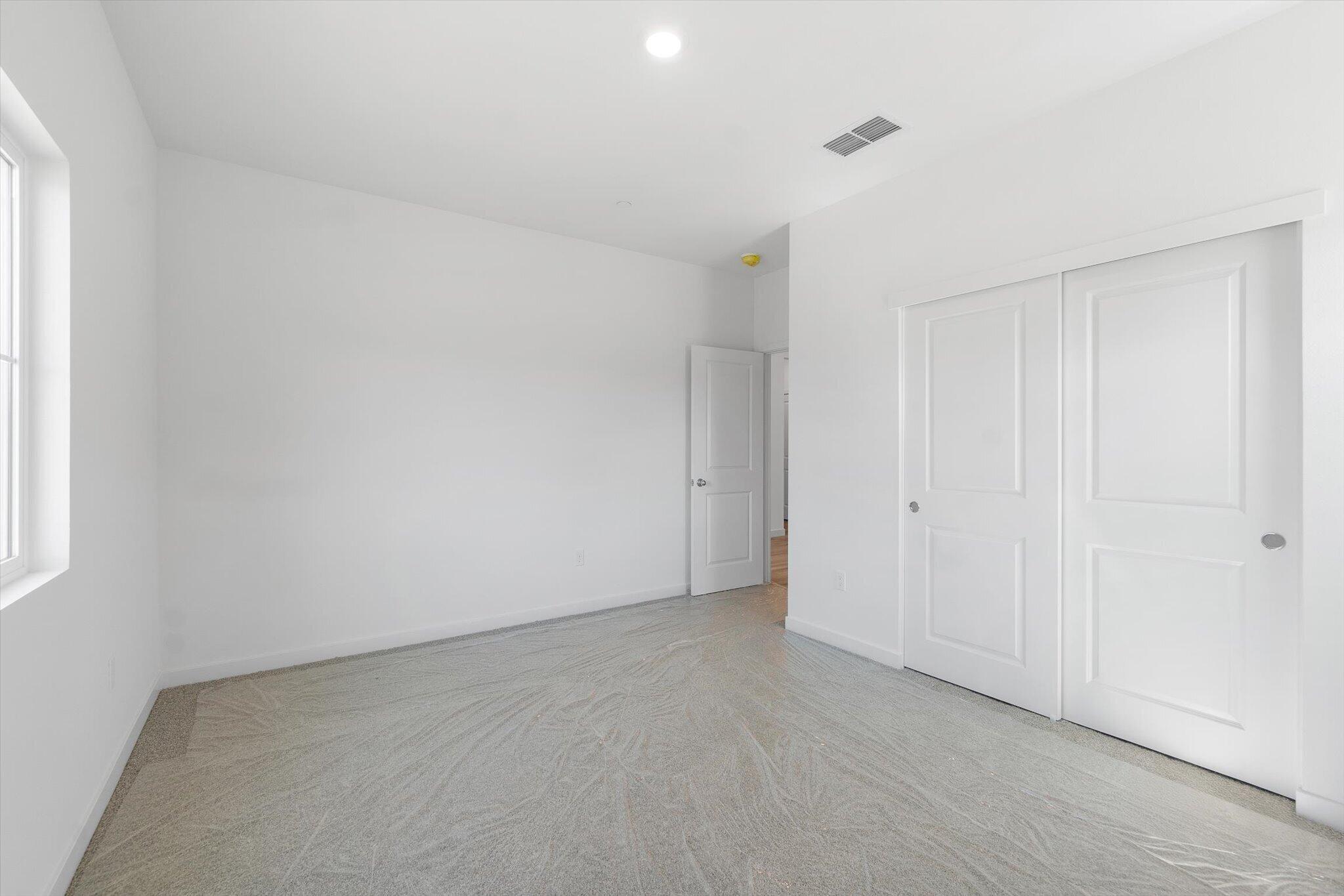 5555 Feathers Avenue Redding, CA 96002 - Photo 20 of 31 a view of an empty room and a window
