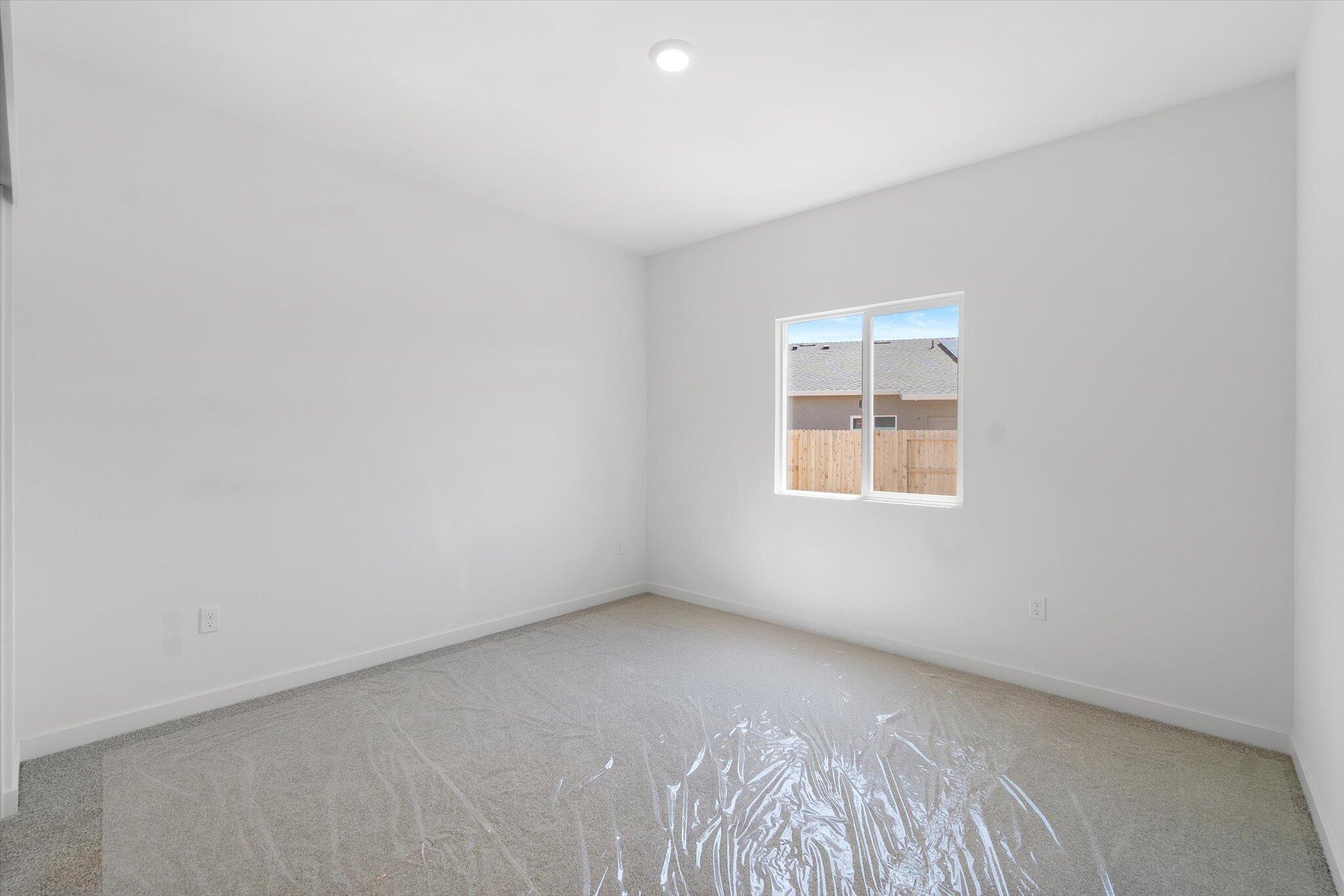5555 Feathers Avenue Redding, CA 96002 - Photo 21 of 31 an empty room with a window