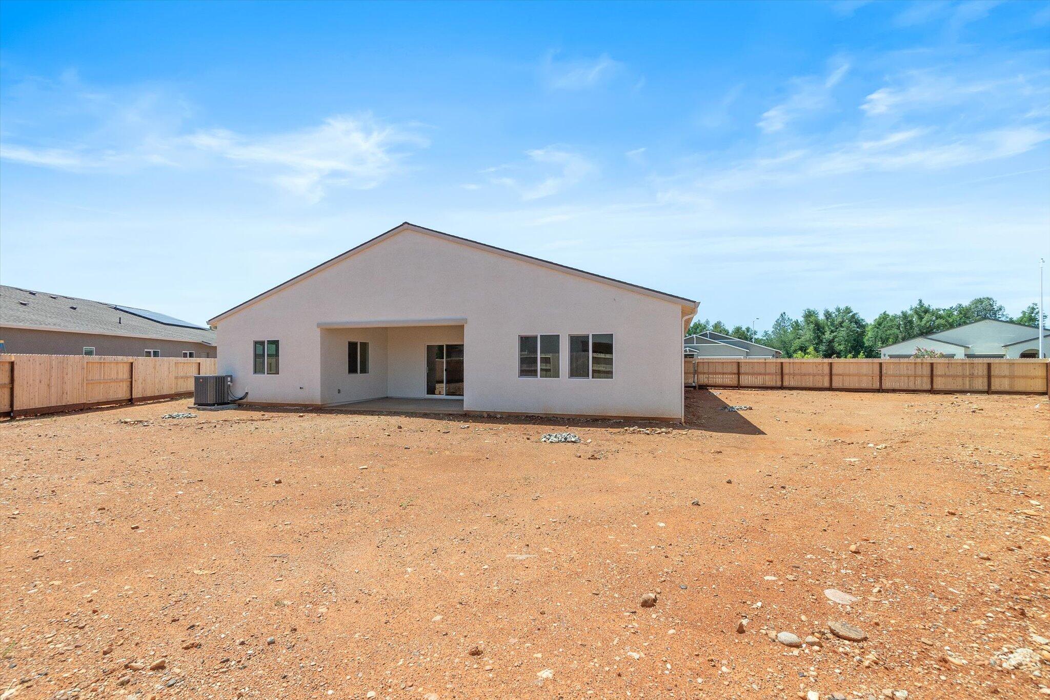 5555 Feathers Avenue Redding, CA 96002 - Photo 28 of 31 a house with a outdoor space