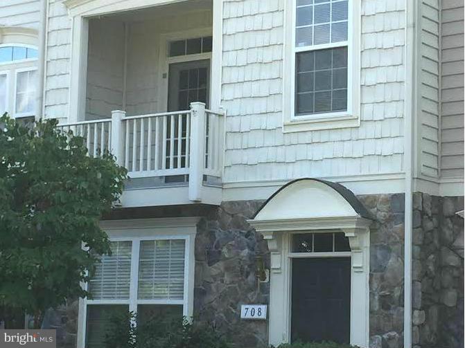 708 Redgate Lane Woodbridge, VA 22191 - Photo 1 of 20 a front view of a house with a yard