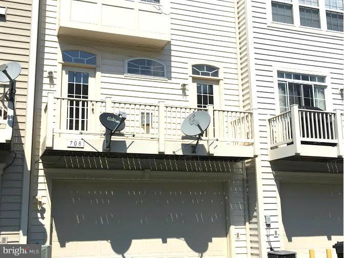 708 Redgate Lane Woodbridge, VA 22191 - Photo 20 of 20 a view of a house with a balcony