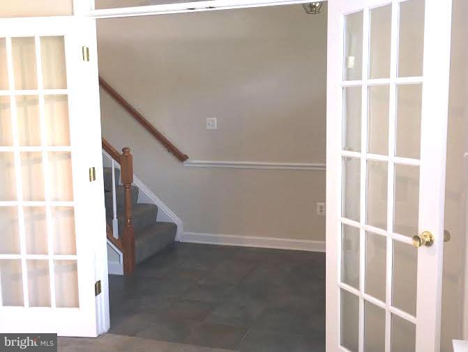 708 Redgate Lane Woodbridge, VA 22191 - Photo 3 of 20 a view of an empty room with stairs