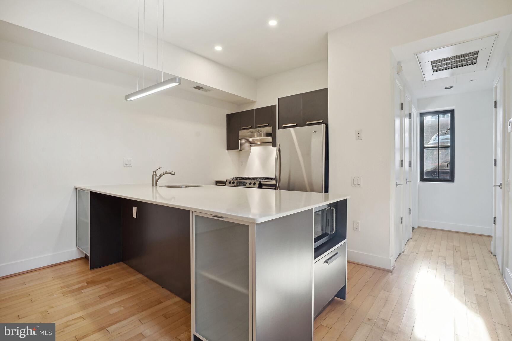 2426 Ontario Road Northwest, Unit 103 Washington, DC 20009 - Photo 12 of 33 Room for Stools at the Counter