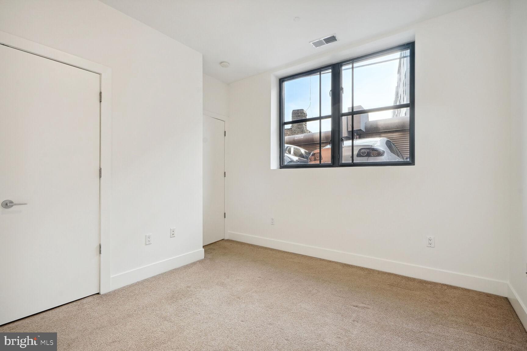 2426 Ontario Road Northwest, Unit 103 Washington, DC 20009 - Photo 17 of 33 Custom Blinds Installed Throughout