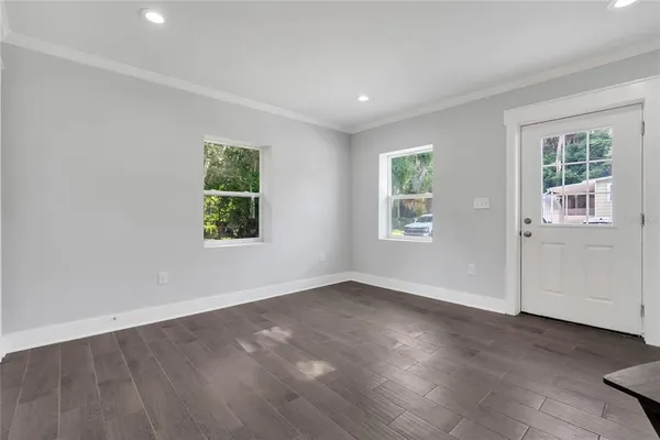 an empty room with windows