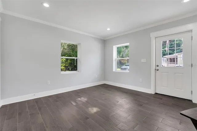 an empty room with windows