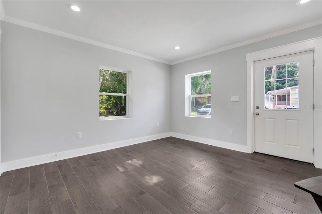 415 South 9th Street Leesburg, FL 34748 - Photo 12 of 37 an empty room with windows