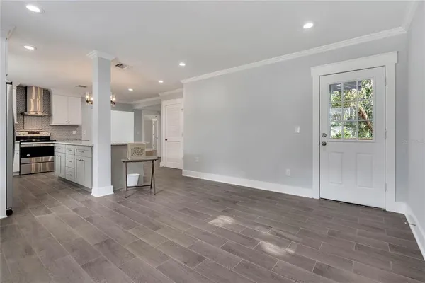 a view of kitchen with wooden floor