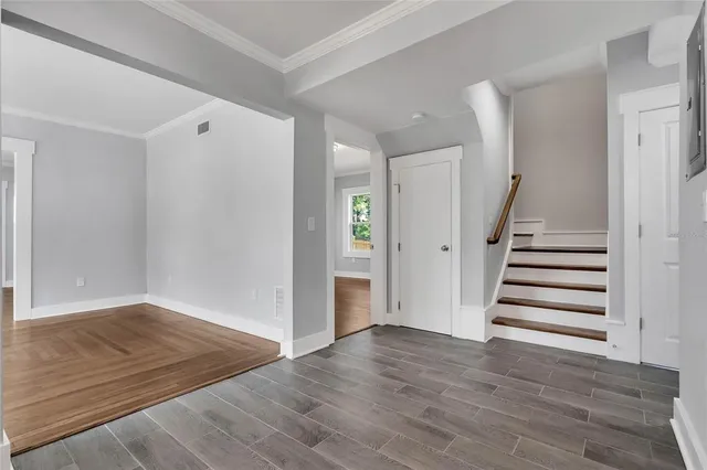 a view of entryway with wooden floor