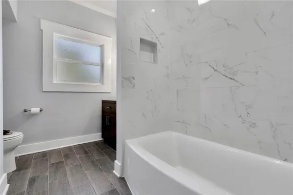 a bathroom with a bathtub