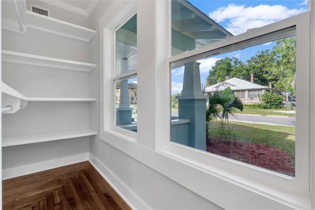415 South 9th Street Leesburg, FL 34748 - Photo 21 of 37 a view of a porch with furniture and garden
