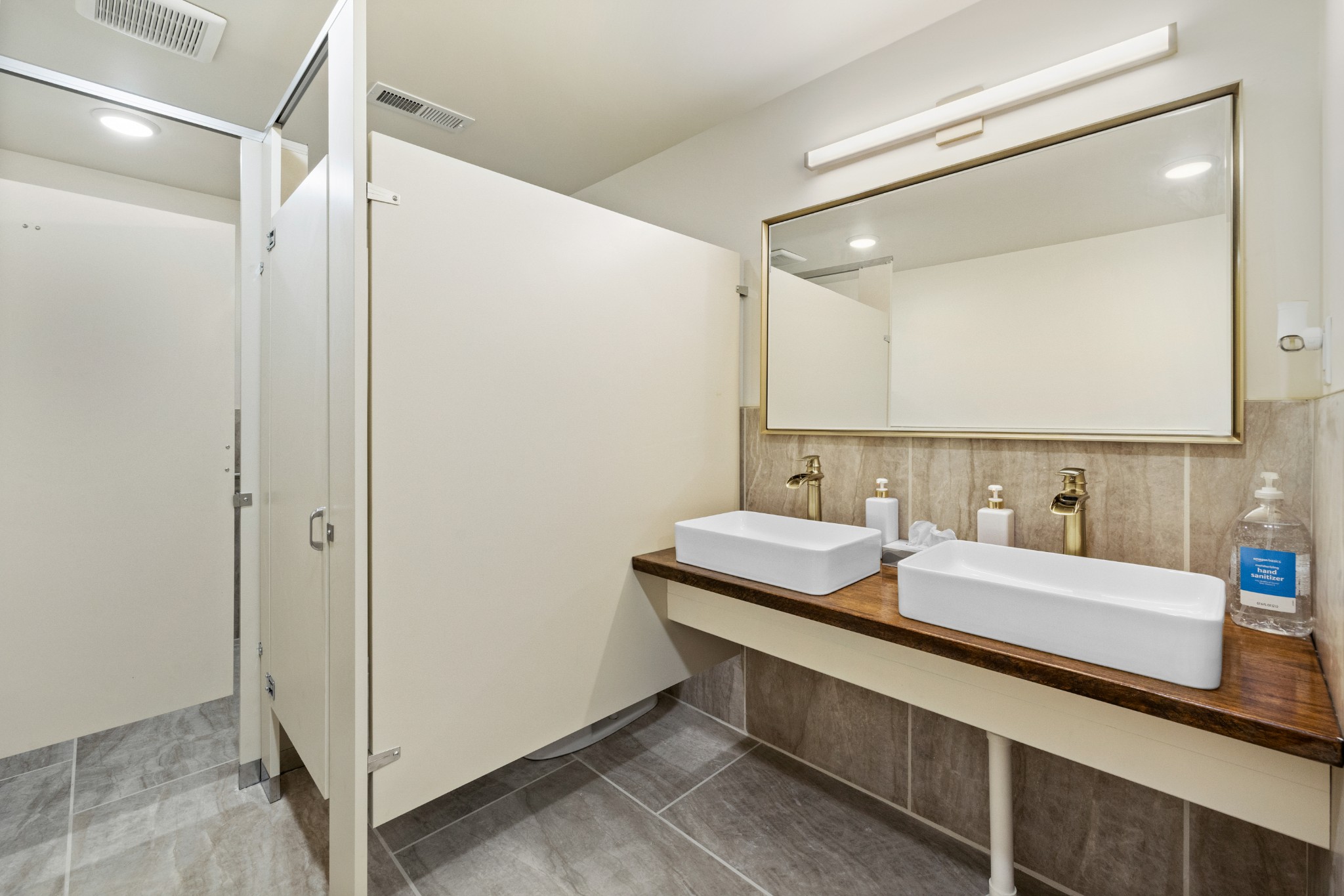 1249 Gulf Road Spencer, TN 38585 - Photo 28 of 98 a bathroom with a double vanity sink and a mirror