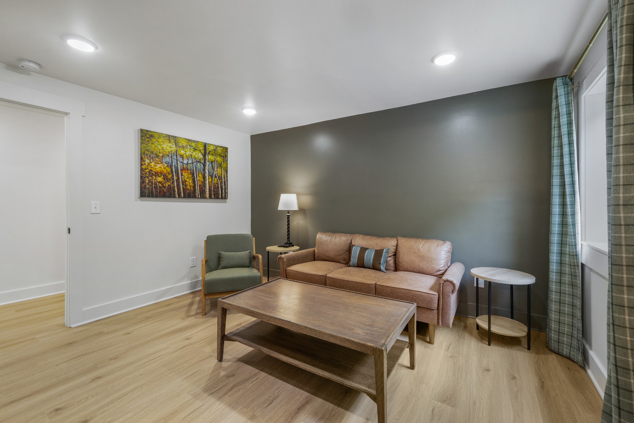1249 Gulf Road Spencer, TN 38585 - Photo 33 of 98 a living room with furniture and a wooden floor
