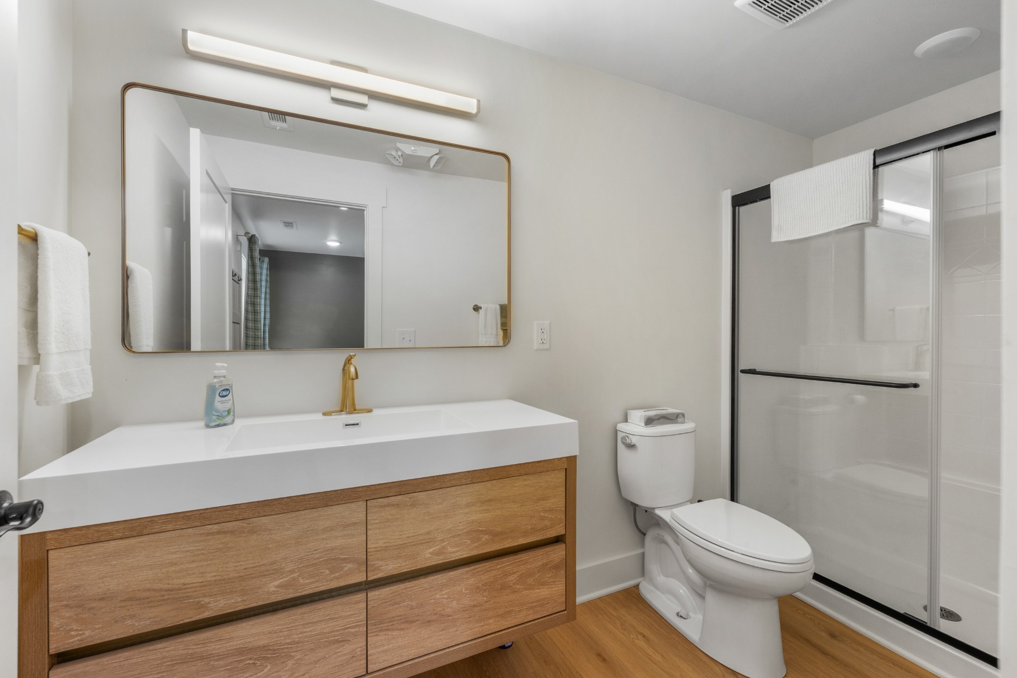 1249 Gulf Road Spencer, TN 38585 - Photo 34 of 98 a bathroom with a sink a toilet a mirror and shower